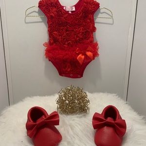 Red rosey bodysuit with matching red bow shoes